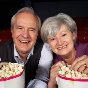bigstock-Senior-Couple-Watching-Film-In-38636263.jpg