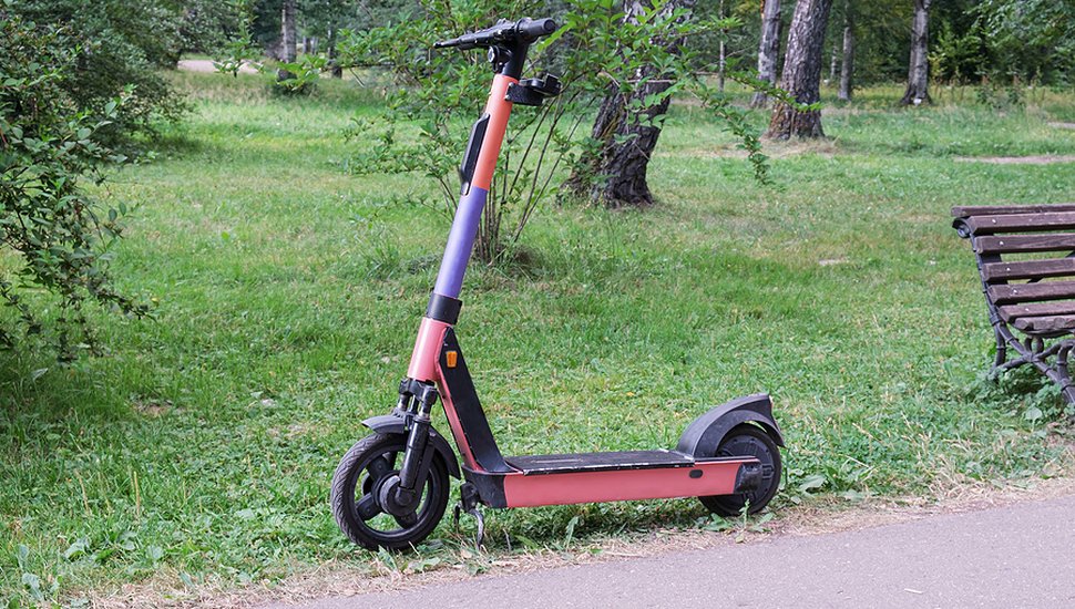 bigstock-Abandoned-Electric-Scooter-Nea-430550045.jpg