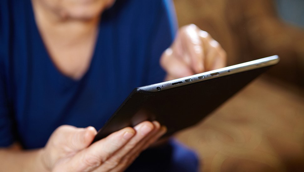 bigstock-Elderly-Woman-With-Tablet-Comp-77523311.jpg