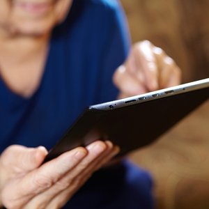 bigstock-Elderly-Woman-With-Tablet-Comp-77523311.jpg