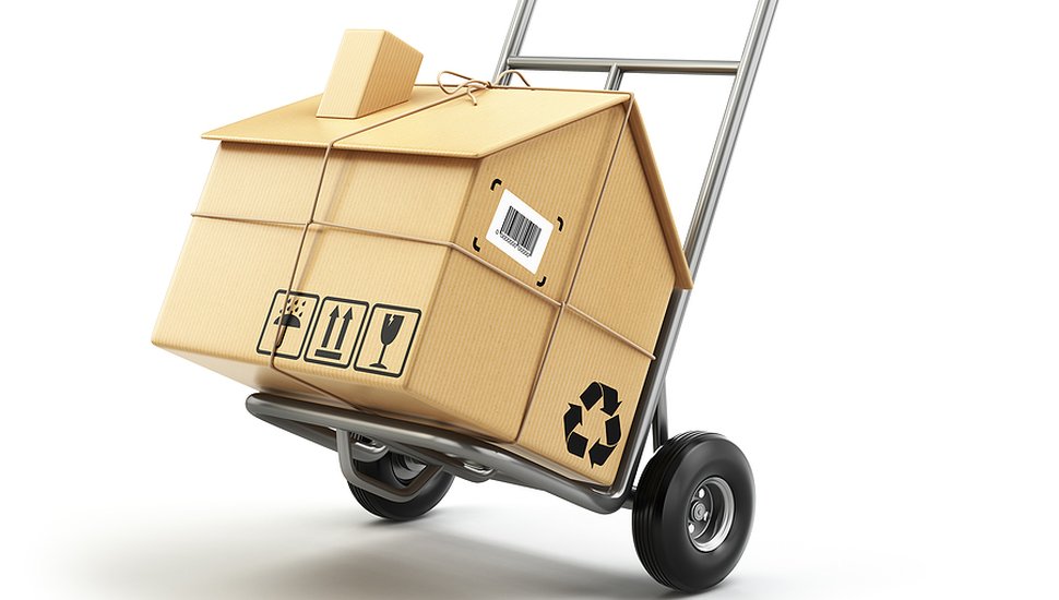 bigstock-Hand-truck-with-cardboard-box--116516870.jpg