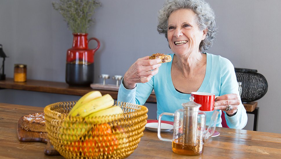 bigstock-Happy-Senior-Lady-Enjoying-Des-285242866.jpg