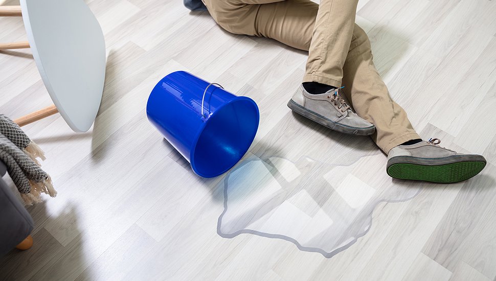 bigstock-Mature-Man-Falling-On-Wet-Floo-317336434.jpg