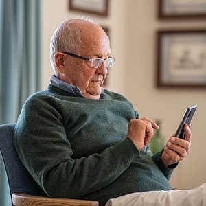 bigstock-Old-man-wearing-eyeglasses-to--433270475.jpg