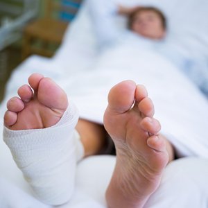 bigstock-Patient-with-broken-leg-in-a-p-148068047.jpg