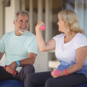 bigstock-Senior-couple-lifting-dumbbell-201195622.jpg