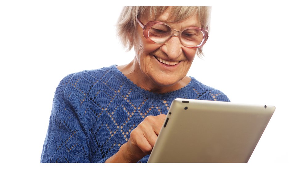 bigstock-Senior-happy-woman-using-ipad--73149421.jpg