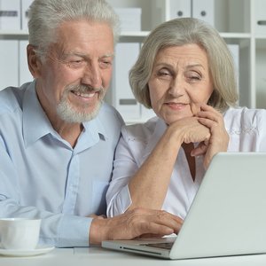 bigstock-happy-senior-couple-with-lapto-111149168.jpg